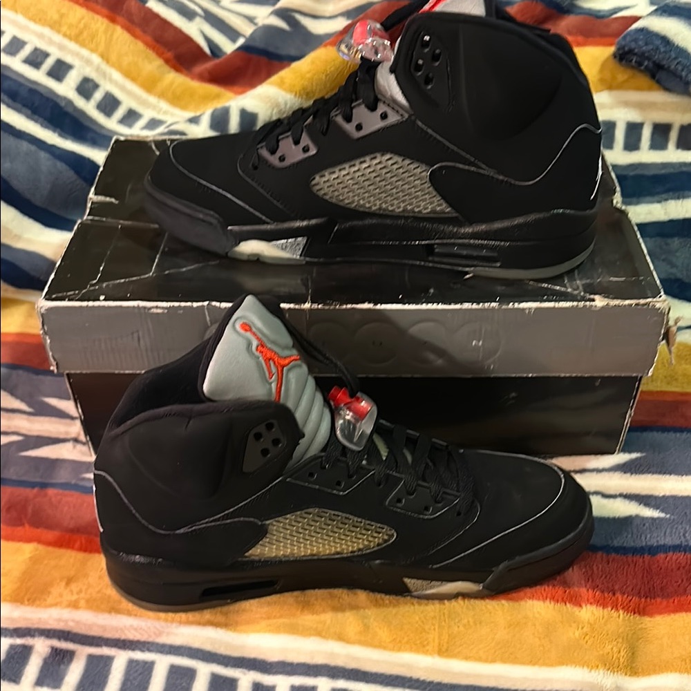 2007 Jordan Black Sneakers with High Ankle Collar and Distinctive Design